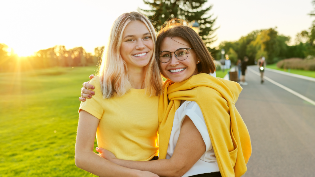 Mother and teenager daughter spending time together and happy